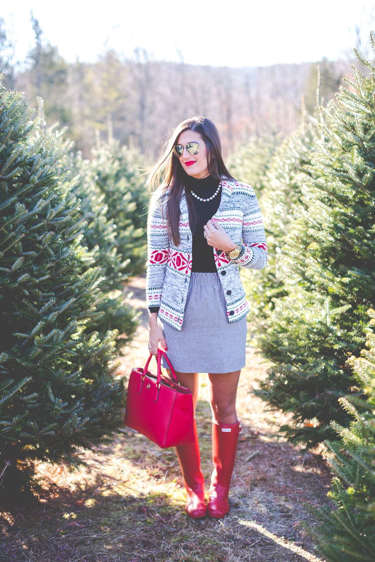 fair isle cardigan, fair isle sweater, gray skirt, red hunter boots, hunter tour packable boots,  christmas tree farm, red tory burch tote, loren hope kaylee necklace // grace wainwright from a southern drawl