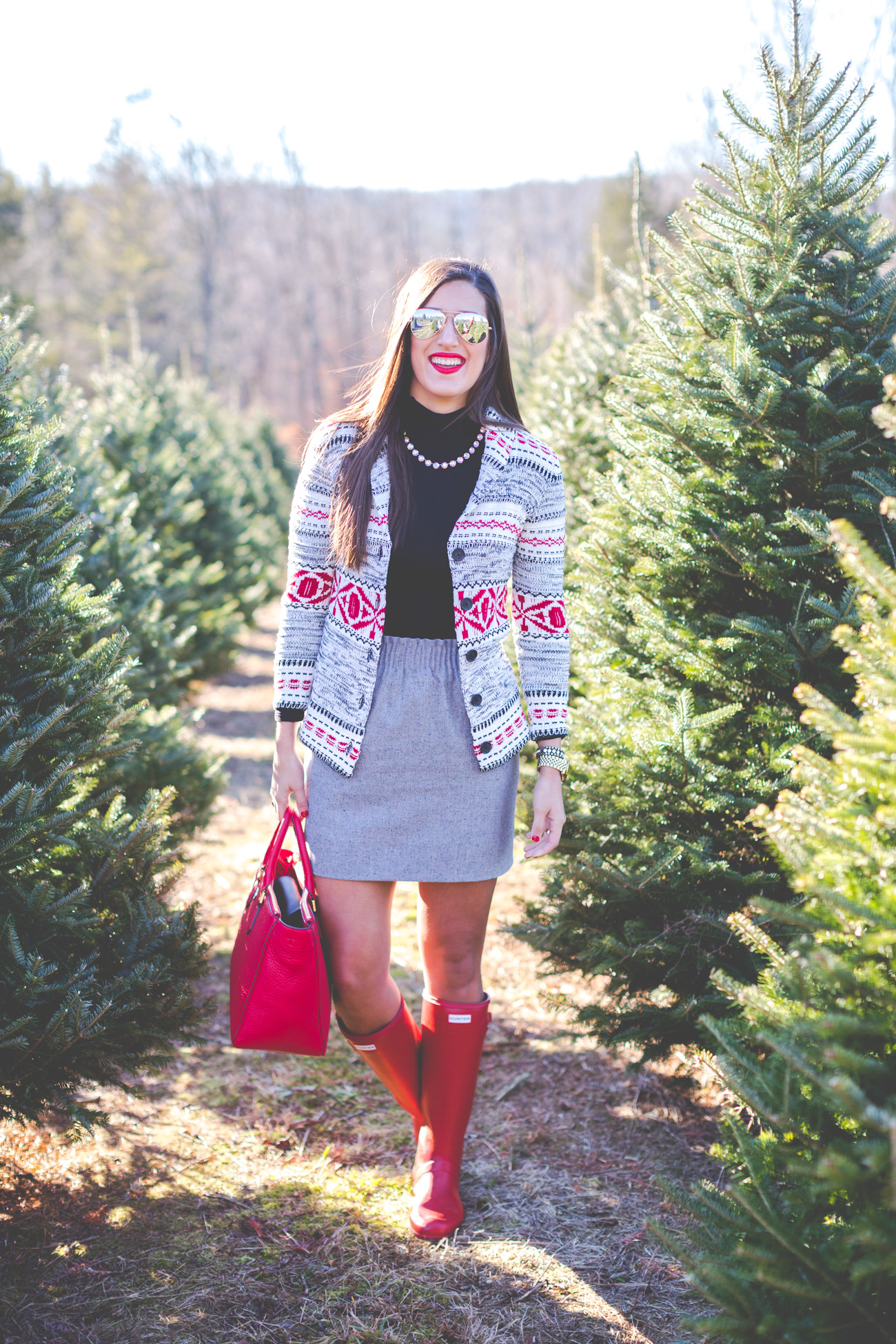 fair isle cardigan, woodstock vermont, fair isle sweater, gray skirt, red hunter boots, hunter tour packable boots,  christmas tree farm, red tory burch tote, loren hope kaylee necklace // grace wainwright from a southern drawl