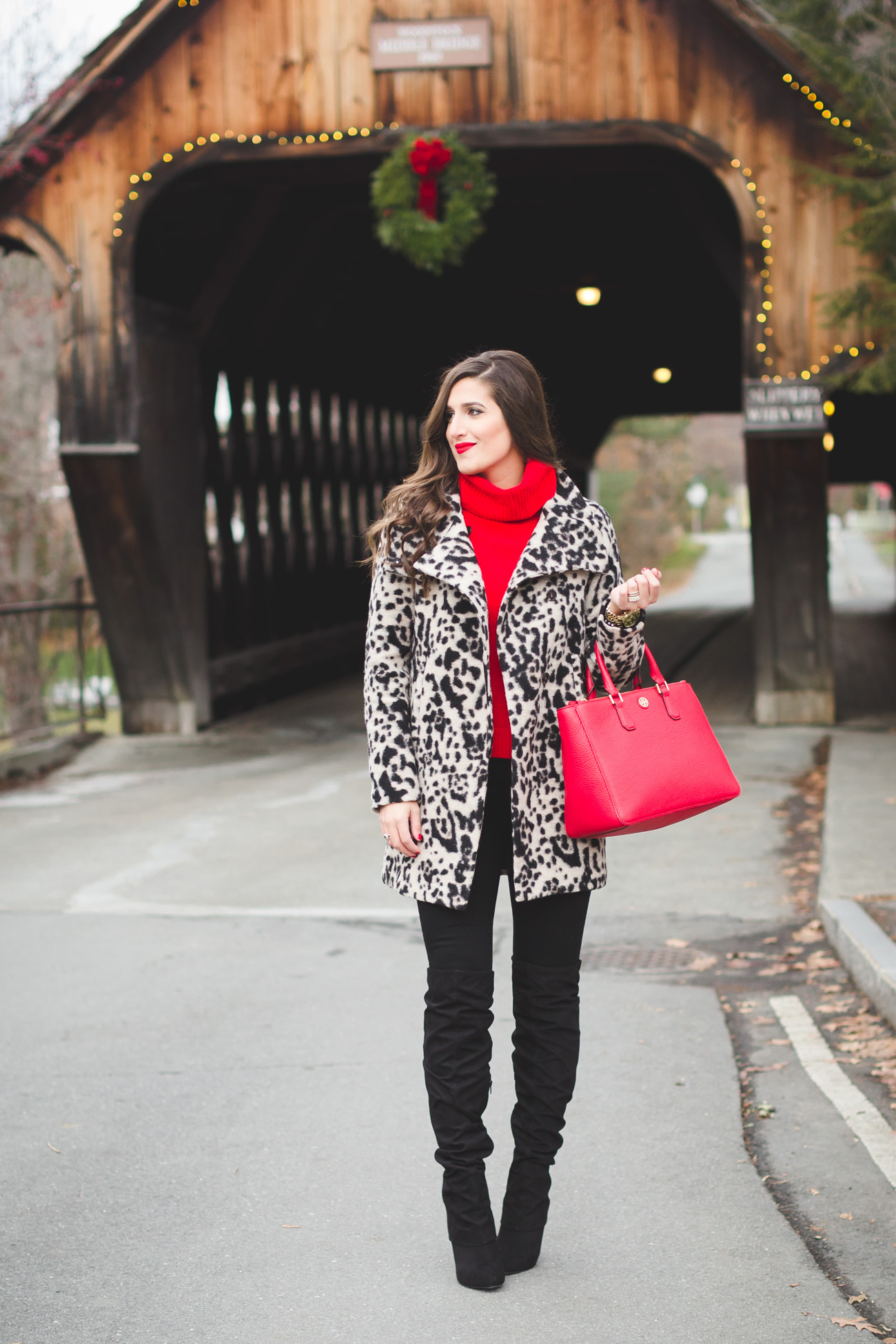covered bridge, woodstock vermont, woodstock vt, leopard coat, statement coat, red turtleneck, over the knee boots, red tory burch robinson pebbled tote, holiday outfit ideas, holiday style, christmas outfit, holiday party outfit // grace wainwright from a southern drawl