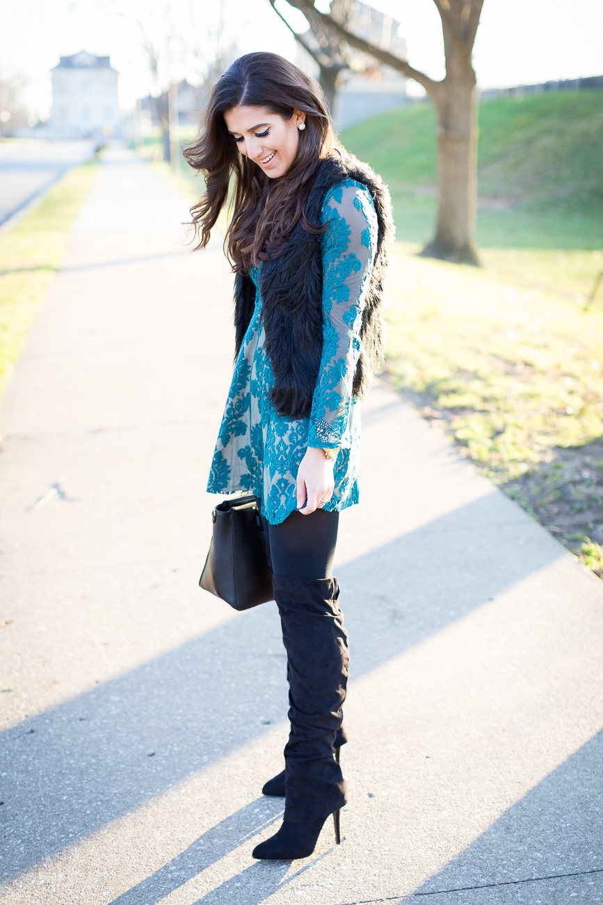 teal lace dress, faux fur vest, winter style, winter fashion, over the knee boots, lace flare dress, fit and flare dress, embroidered lace dress, black fur vest, tory burch robinson pebbled square satchel // grace wainwright from a southern drawl