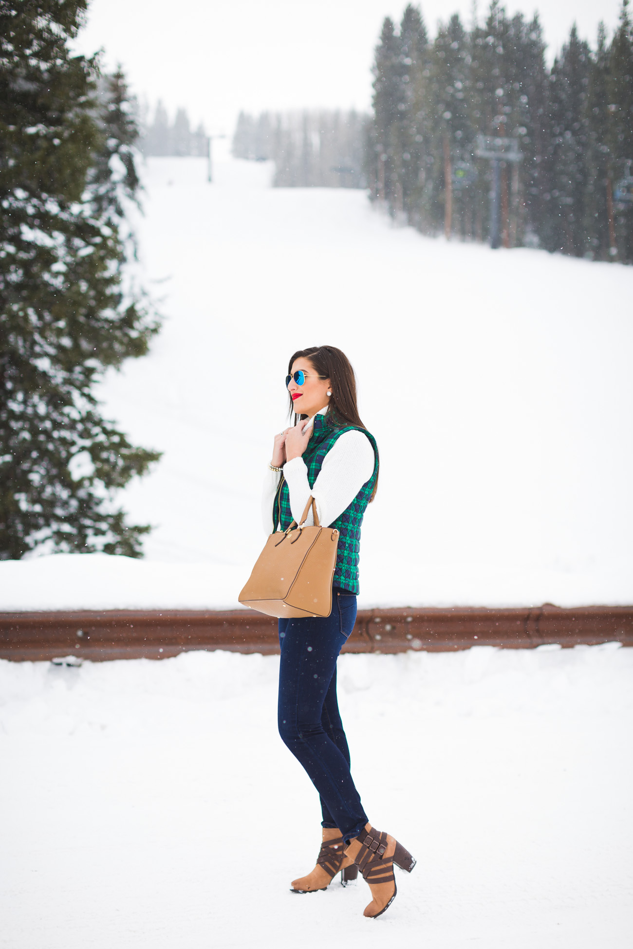 ski turtleneck, winter style, winter fashion, plaid vest, plaid quilted vest, plaid puffer vest, brown booties, colorado, crested butte, ski town, ski sweater, tory burch robinson pebbled square tote, ray ban flash lens, vineyard vines plaid vest // grace wainwright from a southern drawl