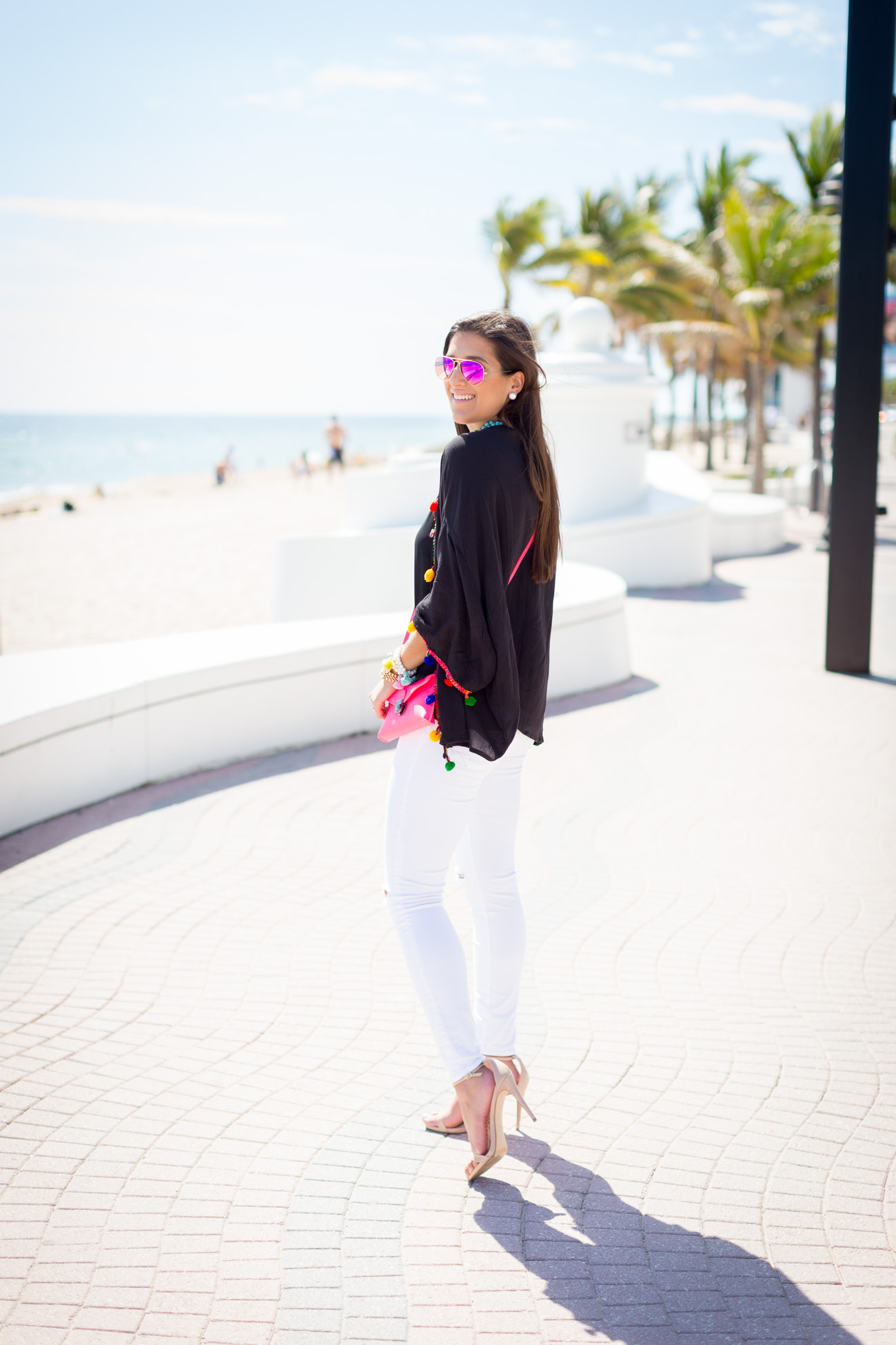 beach kaftan, beach caftan, beach pom caftan, pom pom shirt, pom pom caftan, fuchsia crossbody bag, pink crossbody bag, turquoise statement necklace, turquoise jewelry, beach outfit, beach fashion, vacation outfit, vacation outfit, pink mirror aviators, pom outfit // grace wainwright from a southern drawl