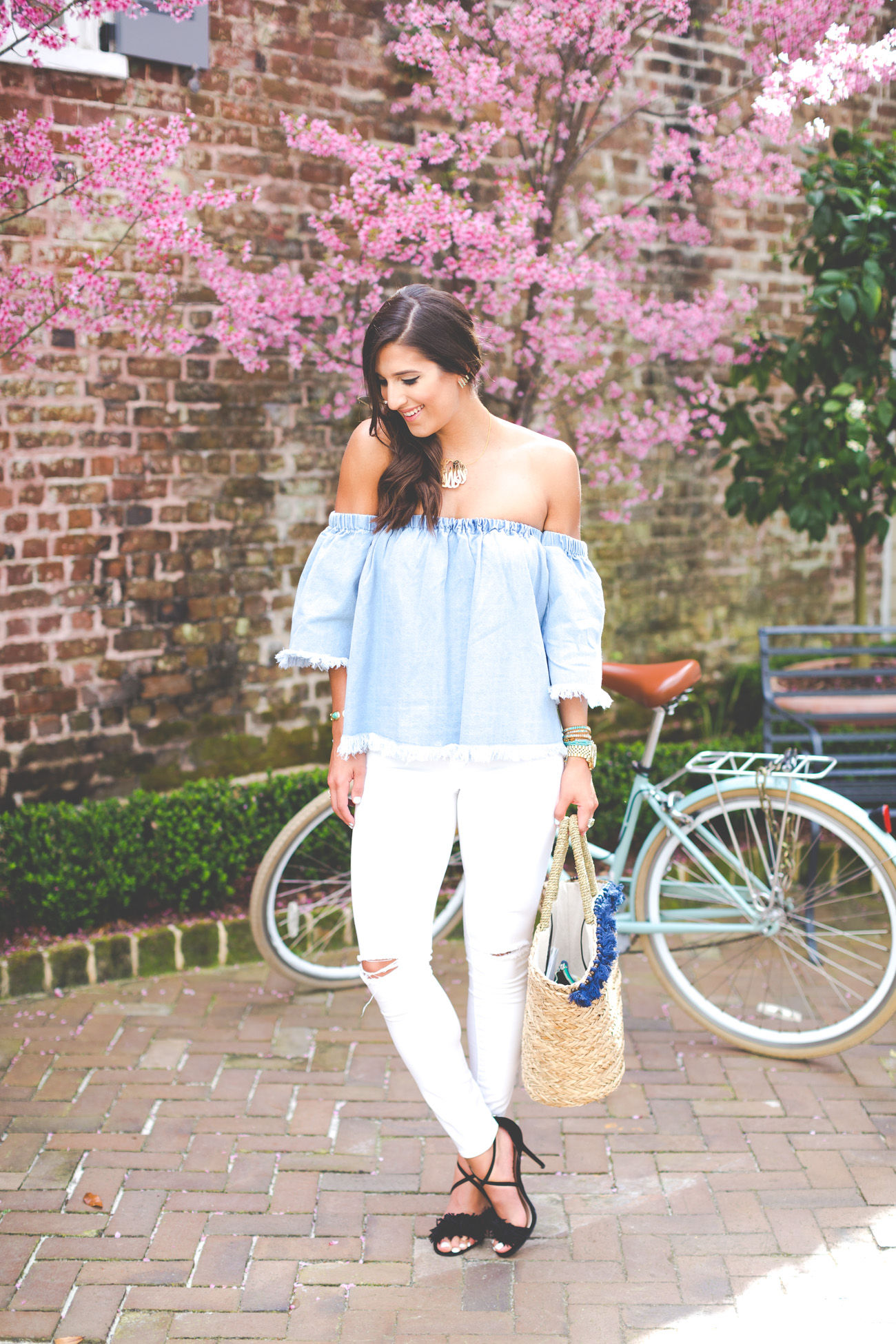 off the shoulder chambray top, chambray shirt, chambray top, off the shoulder top, charleston south carolina, zero george street, bikes charleston, turquoise bikes, tassel straw tote, gold monogram necklace, spring outfit ideas, spring fashion, spring style, spring outfits, spring stylish outfit // grace wainwright from a southern drawl
