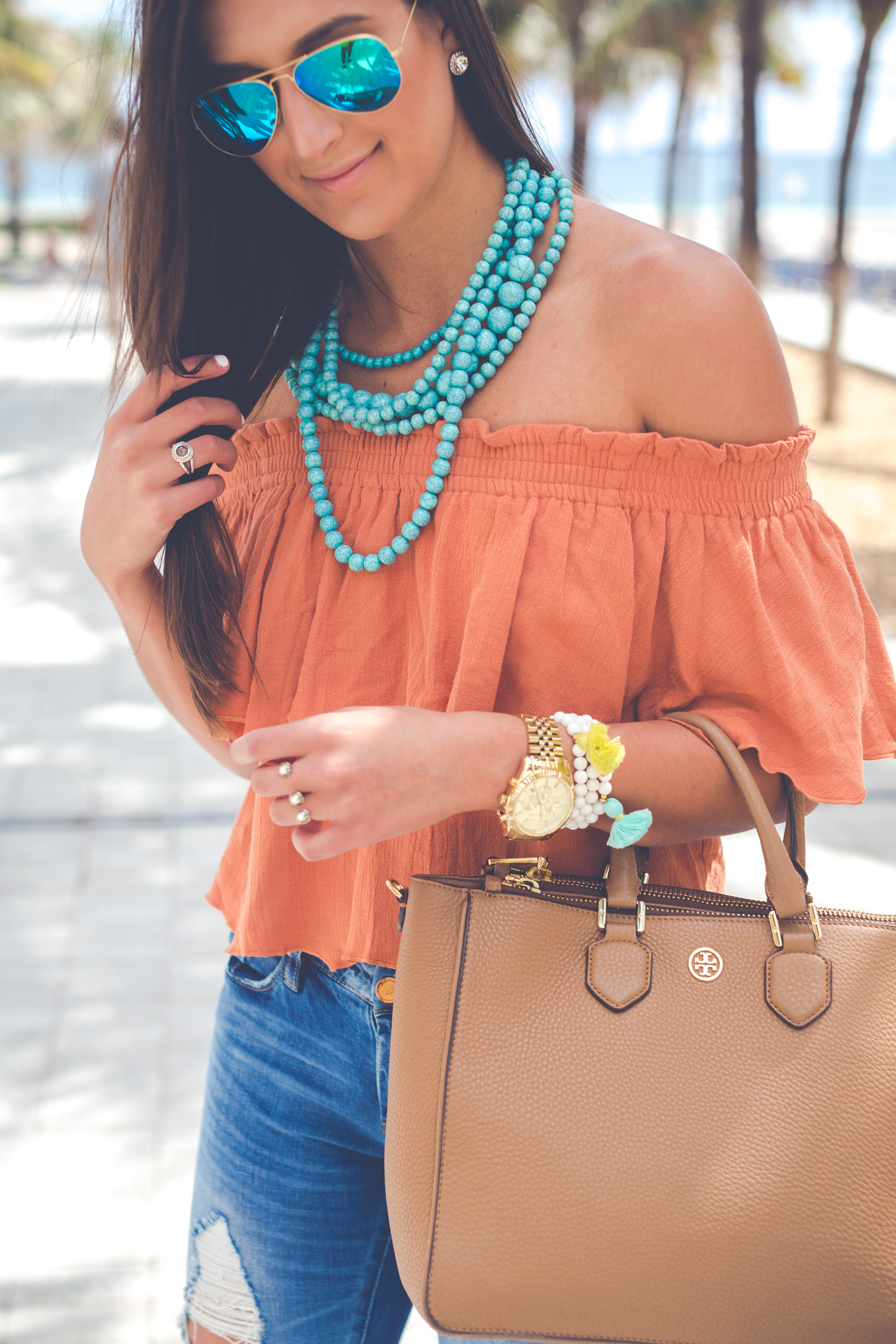 off the shoulder top, turquoise statement necklace, vacation style, vacation outfit, beach outfit, beach fashion, spring break outfit, spring break fashion, somedays lovin off the shoulder top, tassel bracelets, distressed skinny jeans, steve madden stecy sandal, beaded statement necklace, casual fashion, florida outfit // grace wainwright from a southern drawl