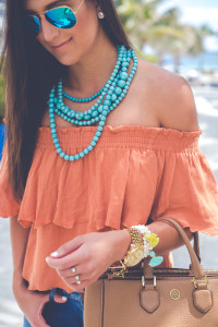 off the shoulder top, turquoise statement necklace, vacation style, vacation outfit, beach outfit, beach fashion, spring break outfit, spring break fashion, somedays lovin off the shoulder top, tassel bracelets, distressed skinny jeans, steve madden stecy sandal, beaded statement necklace, casual fashion, florida outfit // grace wainwright from a southern drawl