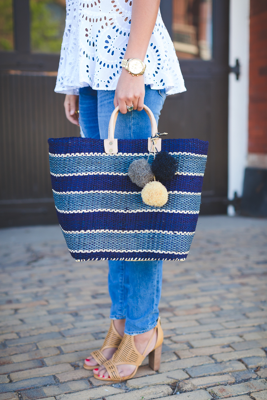 mar y sol capri tote, mar y sol capri woven tote, stripe straw tote, eyelet tunic, free people tunic, free people eyelet top, blank denim distressed jeans, blanknyc distressed jeans, nordstrom eyelet top, spring fashion, spring style, spring trends, vince camuto sandals, mar y sol tote, stripe pom tote // grace wainwright from a southern drawl