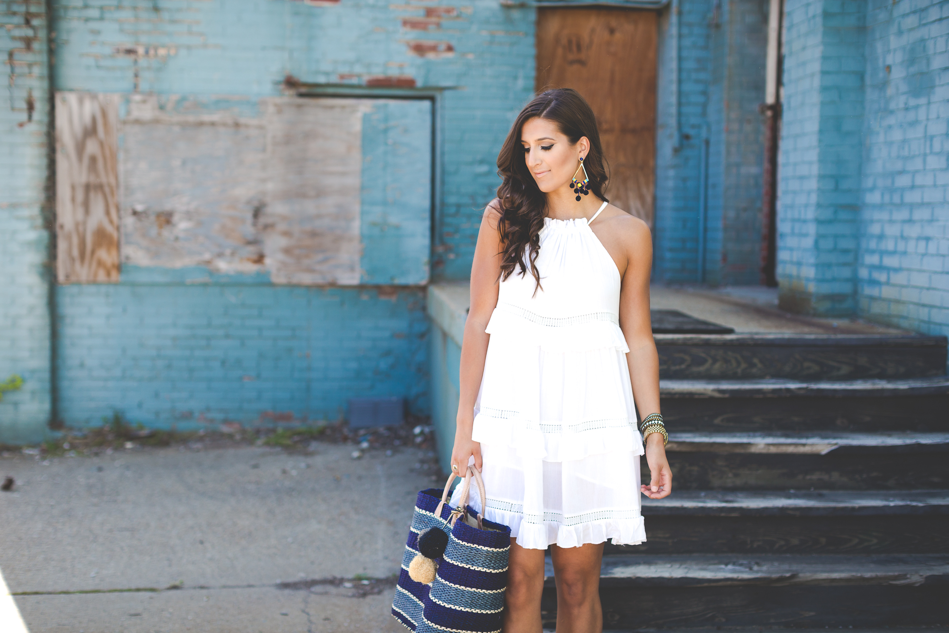white tiered dress, white tier dress, white trapeze dress, little white dress, white sundress, mar y sol capri tote, stripe straw tote, strappy nude wedges, nude espadrilles, pom earrings, pom statement earrings, spring fashion, spring dress, summer dress, summer trapeze dress, chicwish outfit // grace wainwright a southern drawl