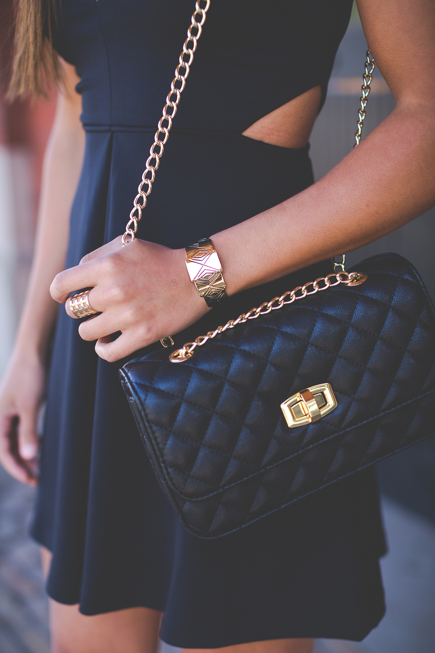 wedding guest outfit, little black dress, couples style, couples fashion, couples goals, black cutout dress, black fit and flare dress, statement earrings, drop earrings, red lipstick, express men fashion, express women fashion, express style, black quilted crossbody purse, graduation outfit // grace wainwright a southern drawl