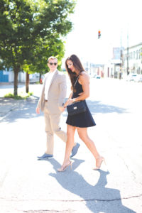 wedding guest outfit, little black dress, couples style, couples fashion, couples goals, black cutout dress, black fit and flare dress, statement earrings, drop earrings, red lipstick, express men fashion, express women fashion, express style, black quilted crossbody purse, graduation outfit // grace wainwright a southern drawl