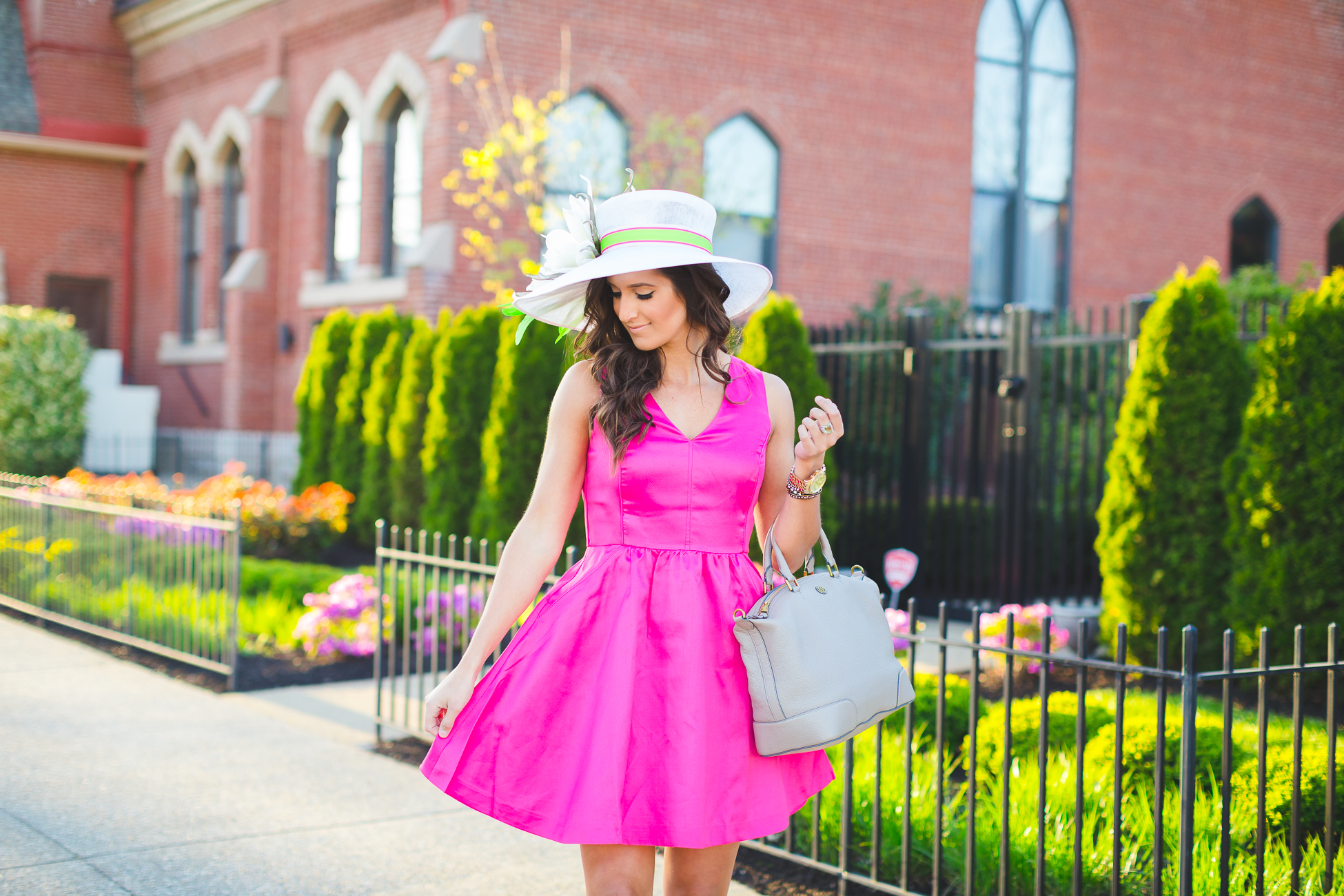 kentucky derby hat, floral hat, vineyard vines pink v-neck fit and flare dress, pink fit and flare dress, spring fit and flare dress, fuchsia dress, kentucky derby outfit, what to wear to the kentucky derby, kentucky oaks, pink fascinator, vineyard vines derby dress, vineyard vines run for the roses dress, gigi new york fold over clutch hot pink, monogram clutch, kentucky derby fascinator, kentucky derby hat, wedding guest outfit, vineyard vines outfit, preppy outfit ideas, preppy fashion, spring dress, spring fashion, preppy spring outfit, preppy spring fashion, preppy spring dress, large monogram necklace, kentucky derby attire // grace wainwright a southern drawl