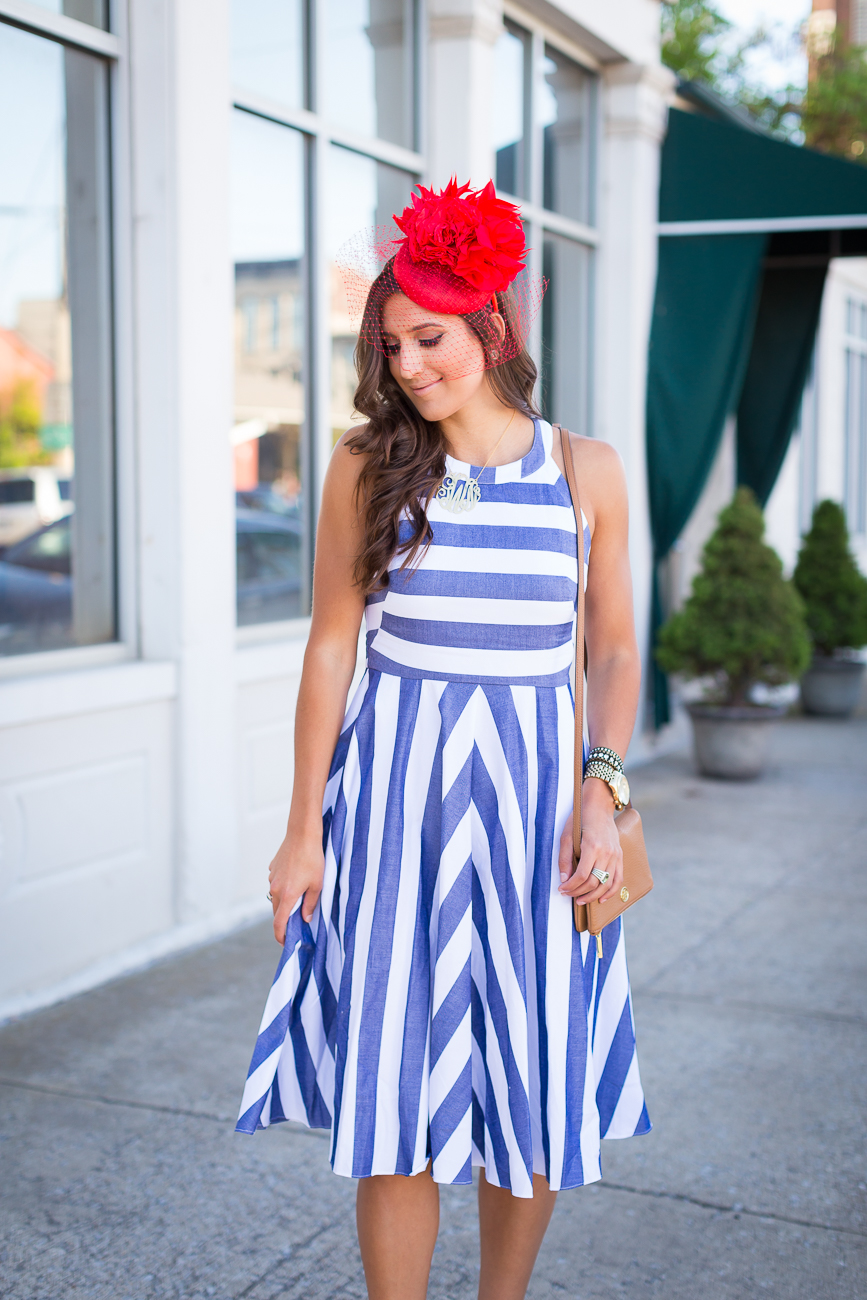 stripe midi dress, kentucky derby hat, floral fascinator, spring stripe dress, stripe fit and flare dress, gold monogram necklace, tory burch foldover crossbody bag, kentucky derby outfit, what to wear to the kentucky derby, kentucky oaks, red fascinator, wedding guest outfit, eliza j dress, preppy outfit ideas, preppy fashion, spring dress, spring fashion, preppy spring outfit, preppy spring fashion, preppy spring dress, large monogram necklace, kentucky derby attire // grace wainwright a southern drawl
