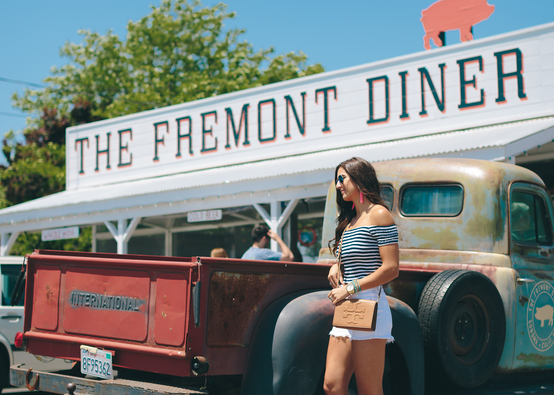 fremont diner, sonoma diner, sonoma dive, wine country diner, stripe off the shoulder top , stripe top, stripe crop top, off the shoulder crop top, high waisted denim shorts, high waist shorts, fringe sandals, sam edelman tassel sandals, tassel jewelry, tassel earrings, tory burch cognac crossbody bag, chan luu wrap bracelets, turquise wrap bracelets, casual style, vacation fashion, vacation style, fashion blogger // grace wainwright a southern drawl
