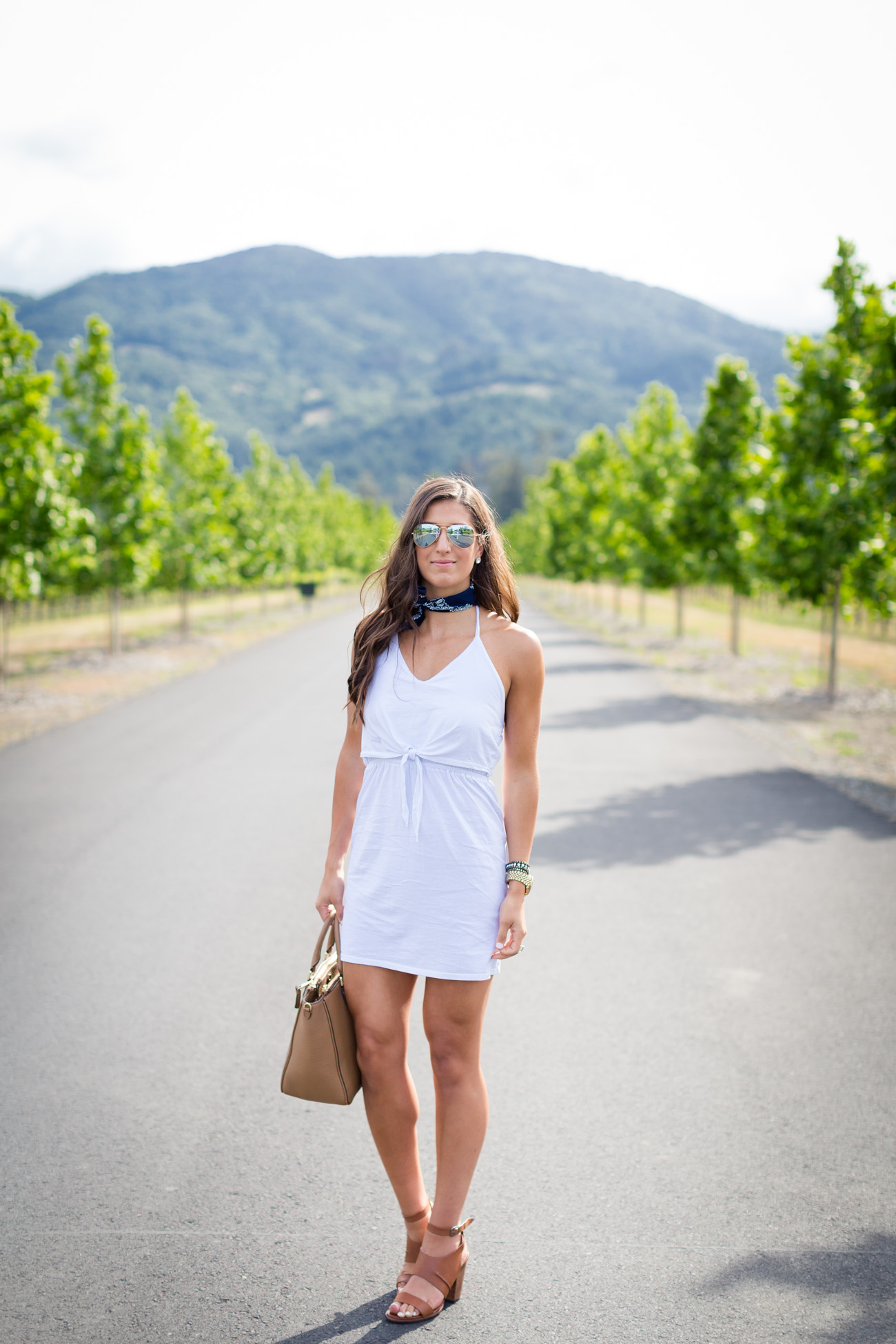 white tie halter dress, white dress, little white dress, napa valley, wine country, st helena california, bandana style, bandana around neck, french inspired outfit, casual outfit, cognac sandals, summer fashion, summer style, travel blogger, kentucky fashion blogger, front tie dress // grace wainwright a southern drawl