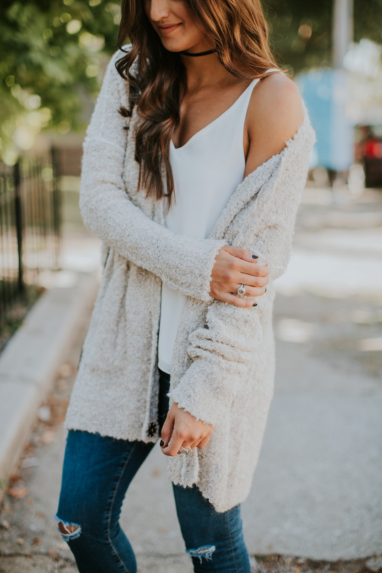 free people boucle cardigan, free people cardigan, ag distressed skinny jeans, lace up booties, fall style, cozy fall outfit, monogram crossbody bag, black monogram crossbody bag, ribbon choker necklace, southern fashion, fall fashion // grace wainwright a southern drawl