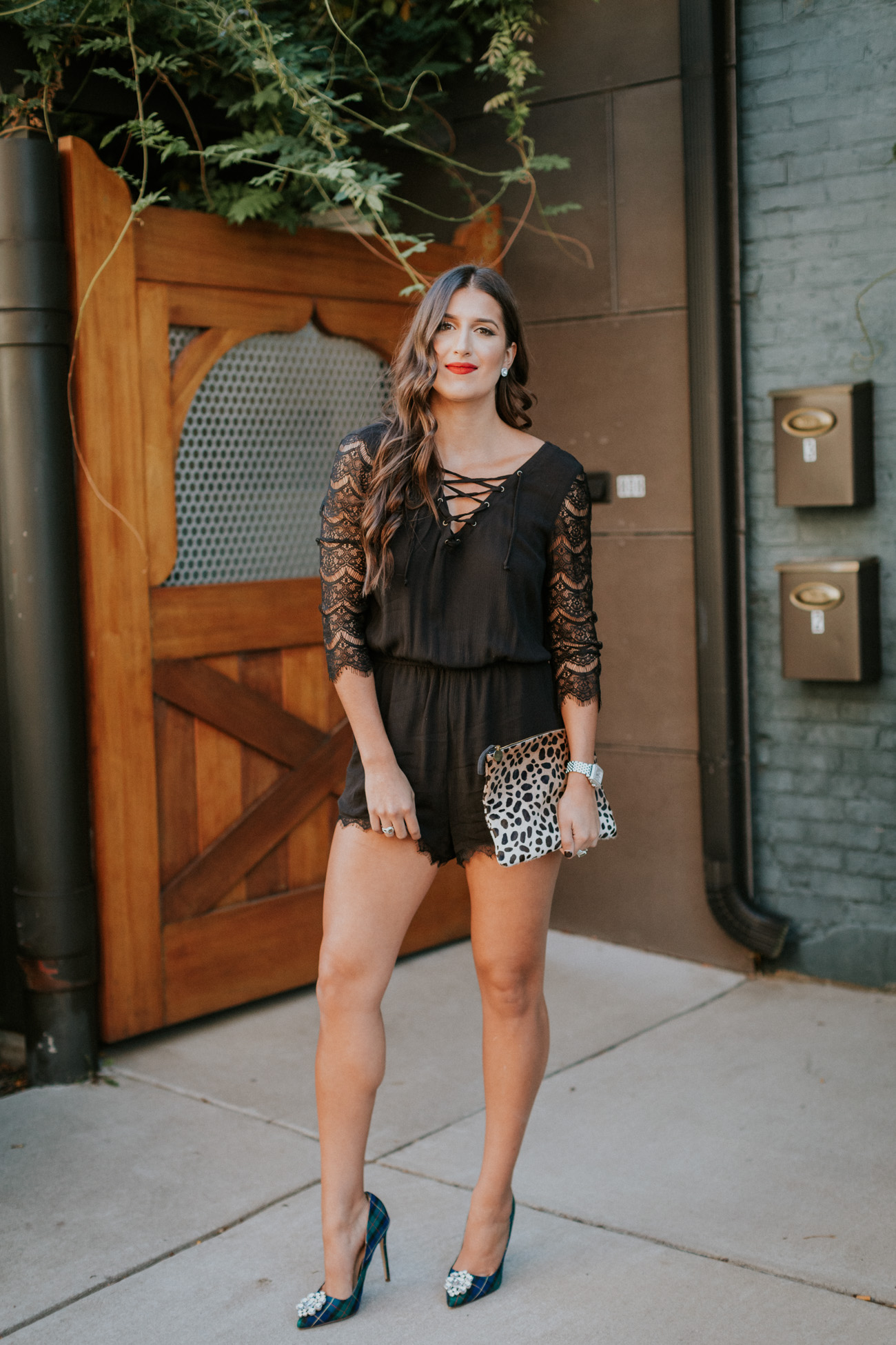 black lace up romper, holiday style, holiday fashion, leopard clutch, calf hair clutch, clare v clutch, clare v leopard clutch, plaid pumps, christmas plaid heels, embellished heels, cute holiday outfit, best matte red lipstick, southern fashion blogger, cute christmas outfit // grace wainwright a southern drawl