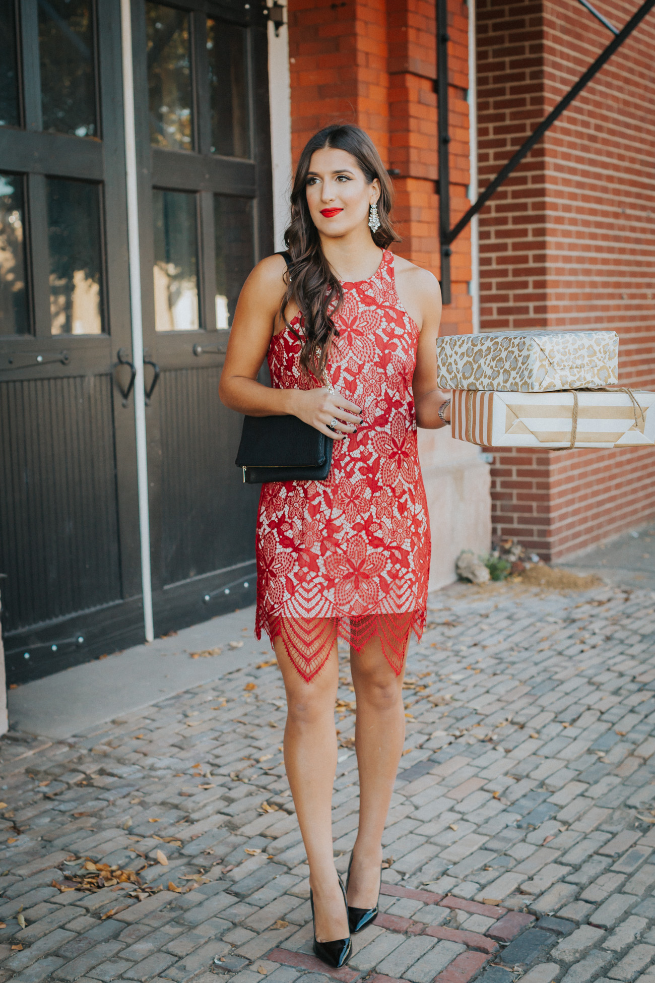 express dress, red lace dress, holiday party outfit, holiday style, holiday dress, christmas dress, christmas party outfit, winter style, black foldover clutch, black pumps, cute holiday look, feminine holiday party, twine present, gold stripe wrapping paper, southern fashion blogger // grace wainwright a southern drawl
