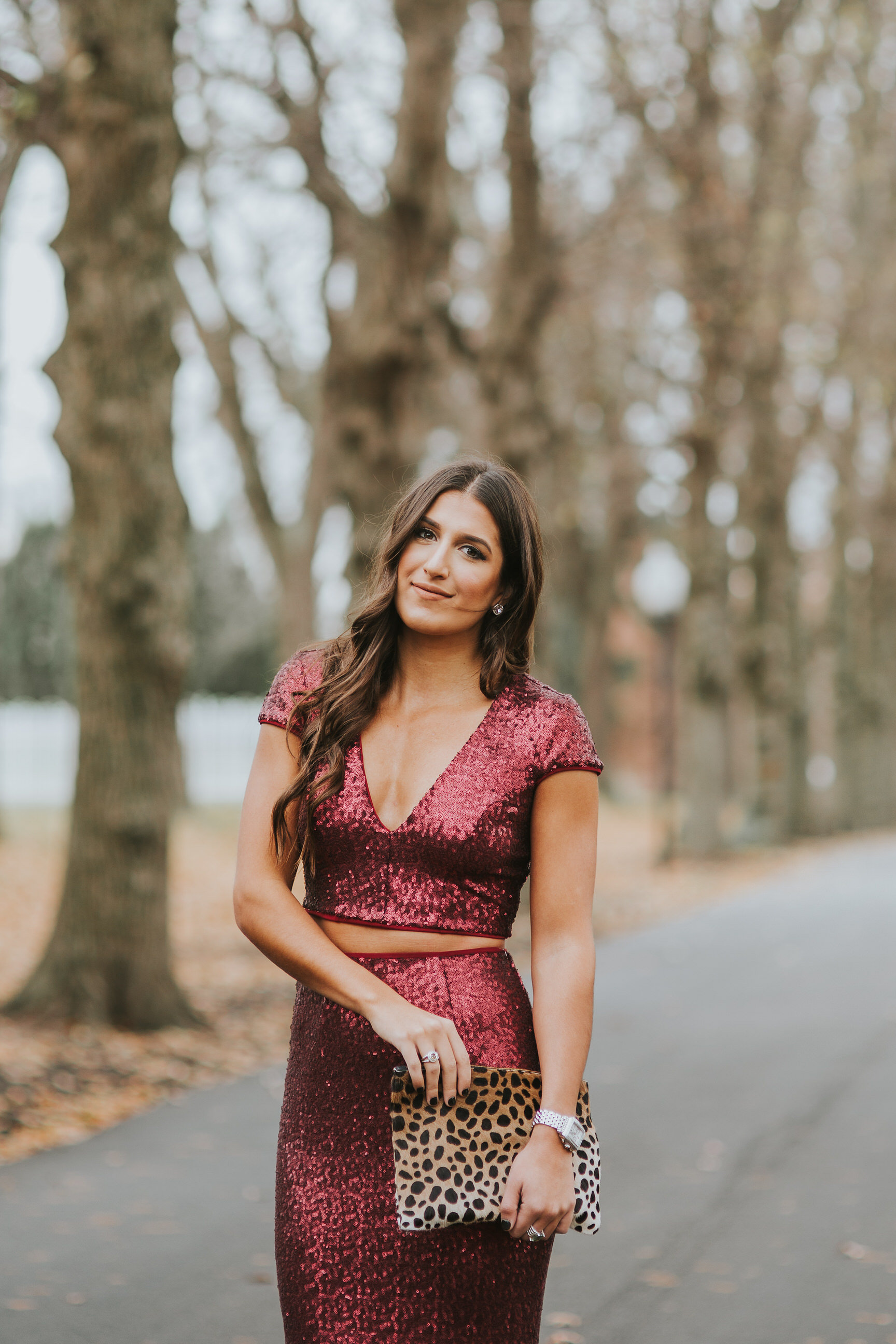 sequin two piece gown, sequin gown, new years eve outfit, new years outfit, new years dress, sequin maxi dress, sequin crop top, leopard clutch, calf hair clutch, nye dress, fancy nye outfit // grace wainwright a southern drawl