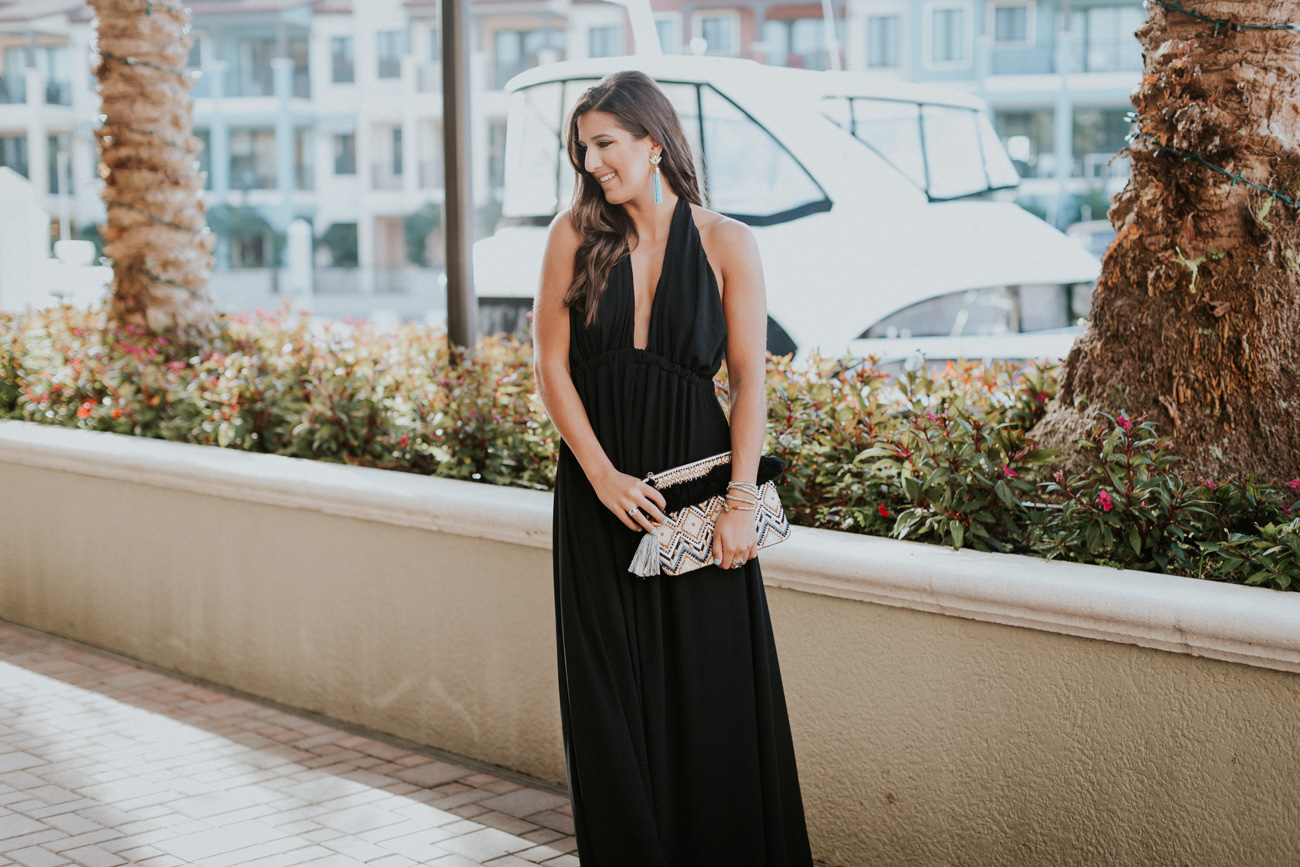 black halter maxi dress, show me your mumu dress, show me your mumu maxi, show me your mumu luna halter gown, vacation style, turquoise tassel earrings, nude wedges, strappy wedge sandals, tassel clutch // grace wainwright a southern drawl