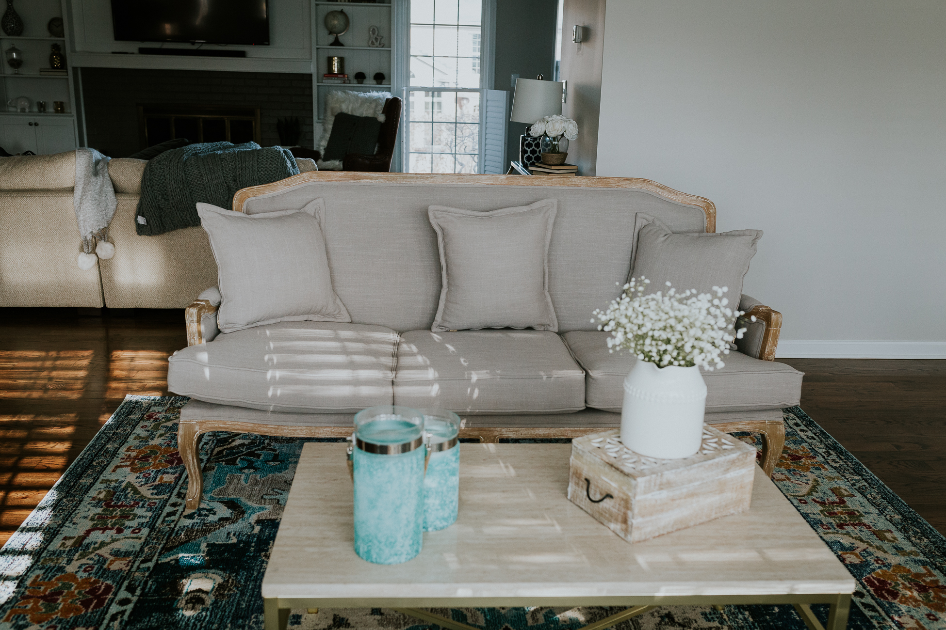formal living room, overstock home decor, home decorations, formal living room decor, french country setee, french country sofa, french country furniture, safavieh rug, safavieh home decor, candle lanterns, gold bench, turquoise accents, a southern drawl home // grace wainwright a southern drawl