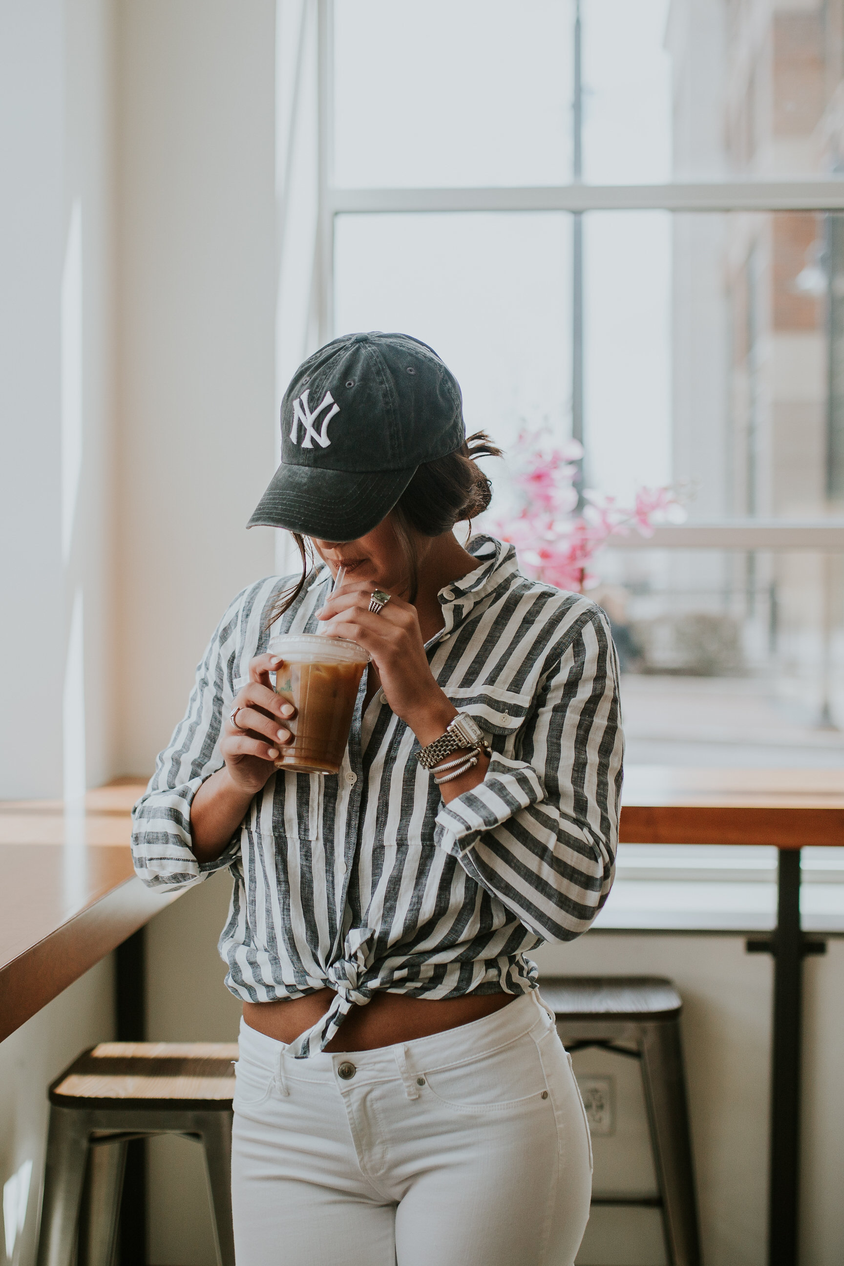 casual everyday outfit, allbirds wool runners, allbirds sneakers, j.crew stripe linen shirt, white distressed skinny jeans, distressed yankees baseball cap, press coffee shop louisville, louisville coffee shops, kentucky blogger, kentucky coffee shops, casual style, casual outfit // grace wainwright a southern drawl