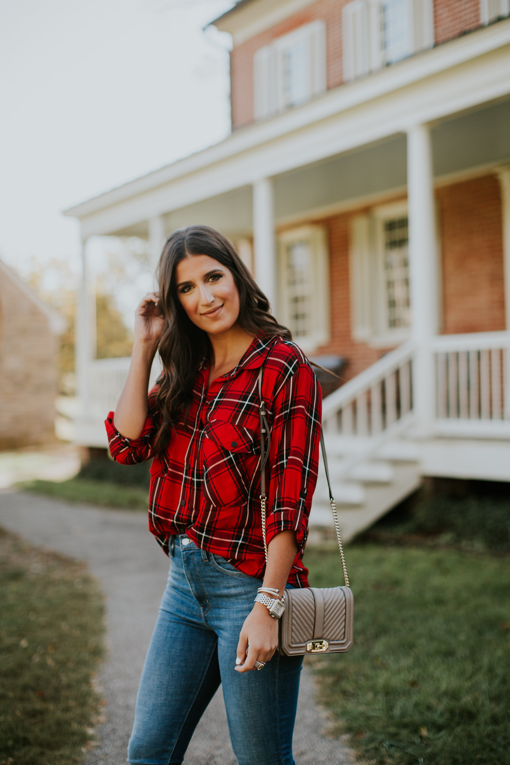 red plaid shirt, holiday plaid shirt, holiday plaid flannel, flannel shirt, high waisted jeans, high waist skinny jeans, lace up heels, rebecca minkoff love crossbody bag, holiday style, holiday fashion, holiday outfits, fall style, fall outfit ideas, fall fashion // grace wainwright a southern drawl