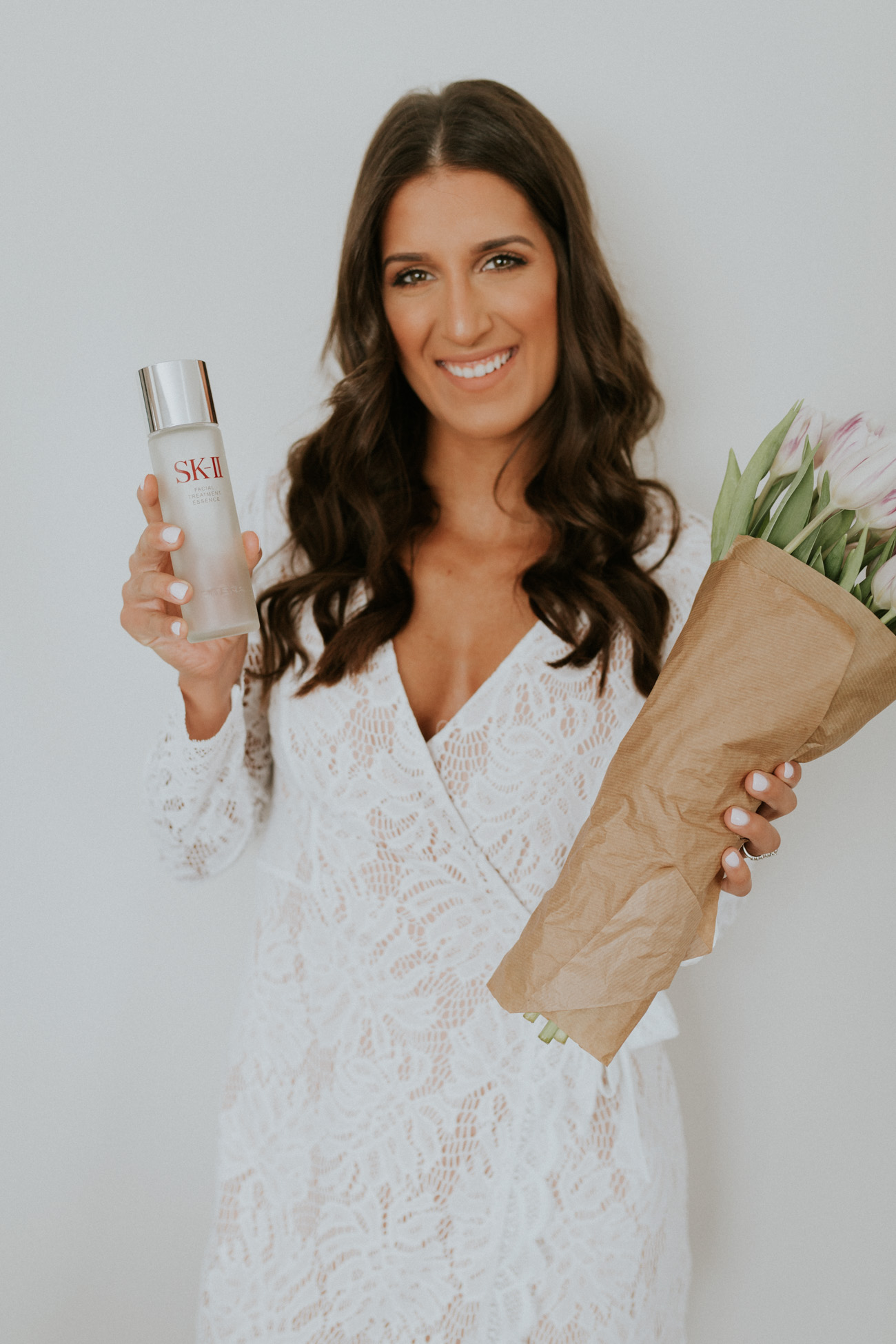 skii miracle water, skii facial treatment essence, bridal shower outfit bridal shower style, skin routine, skincare routine, white lace romper, beauty transformation, skin care transformation, ski-ii facial treatment essence // grace wainwright a southern drawl