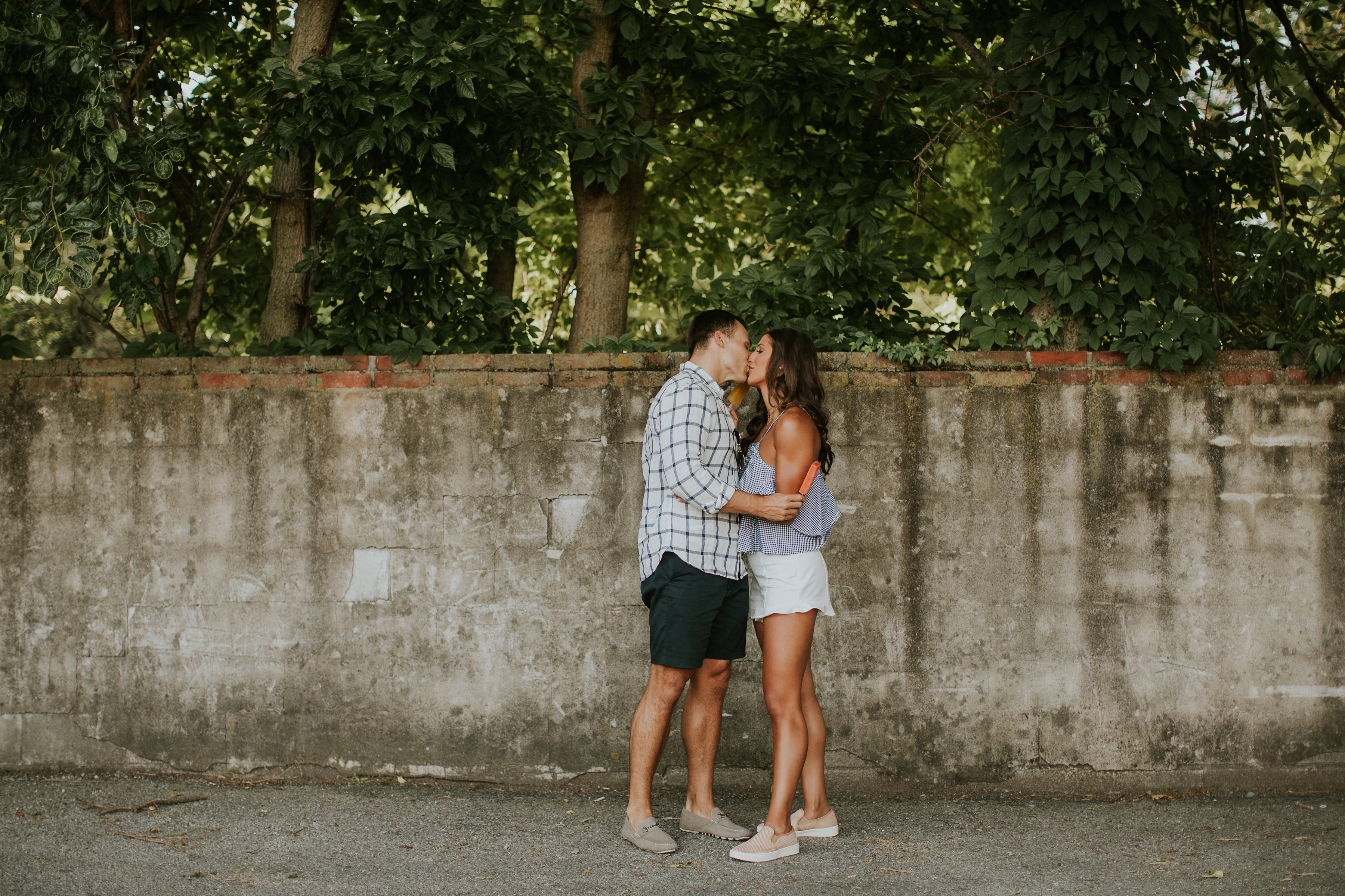 summer date night outfit, summer date nights, date night outfit, summer outfit for him, boyfriend style, a southern drawl fiance, gingham top, gingham style, ruffle shorts, casual sneakers, trendy slip ons, summer date night ideas, a southern drawl fiance, jordan white a southern drawl // grace wainwright 