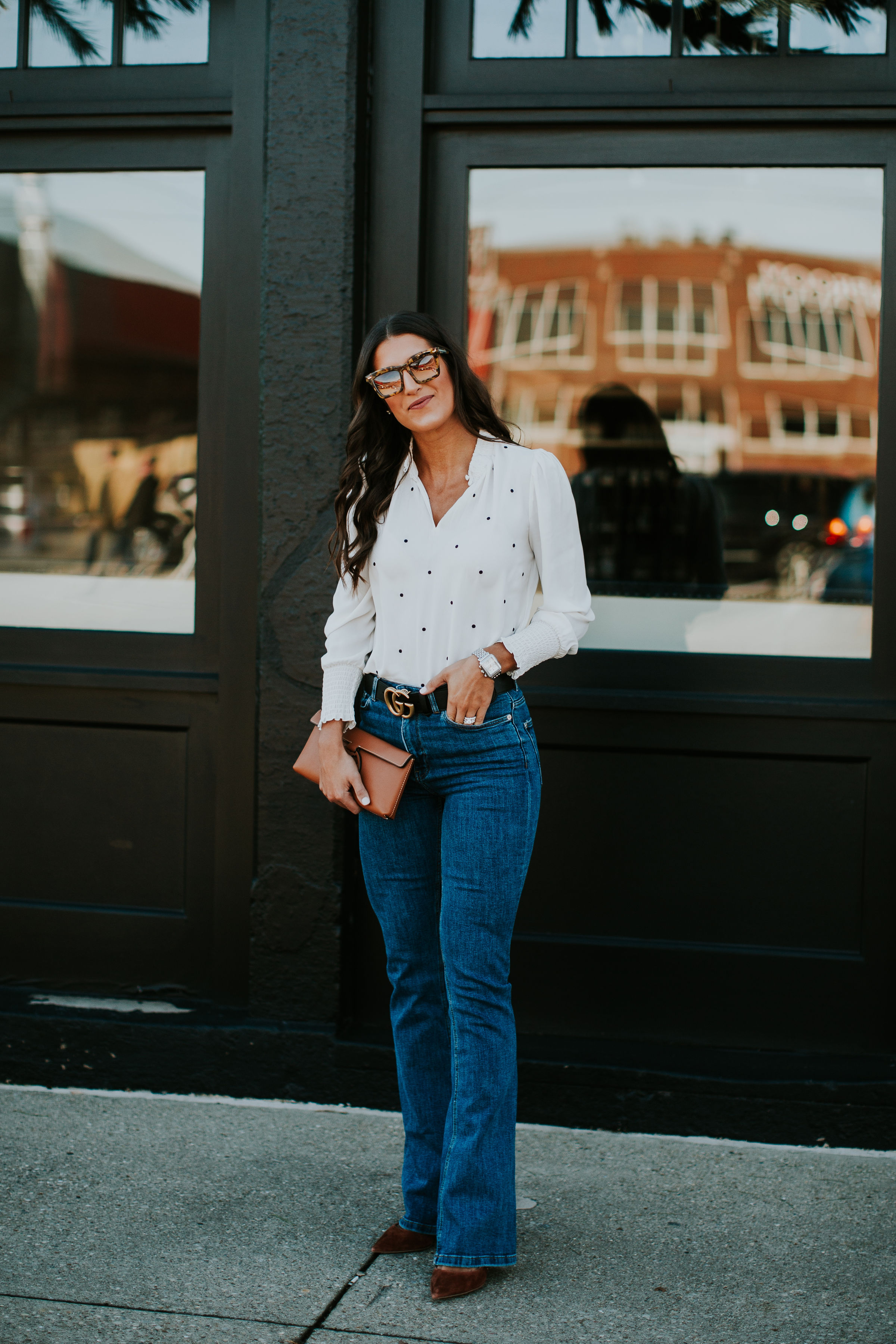 polka dot blouse, chiffon blouse, flare jeans, flared jeans, flare denim, classic style, black gucci belt, nude clutch, patent leather clutch, karen walker sunglasses, spring style, spring fashion // grace white a southern drawl