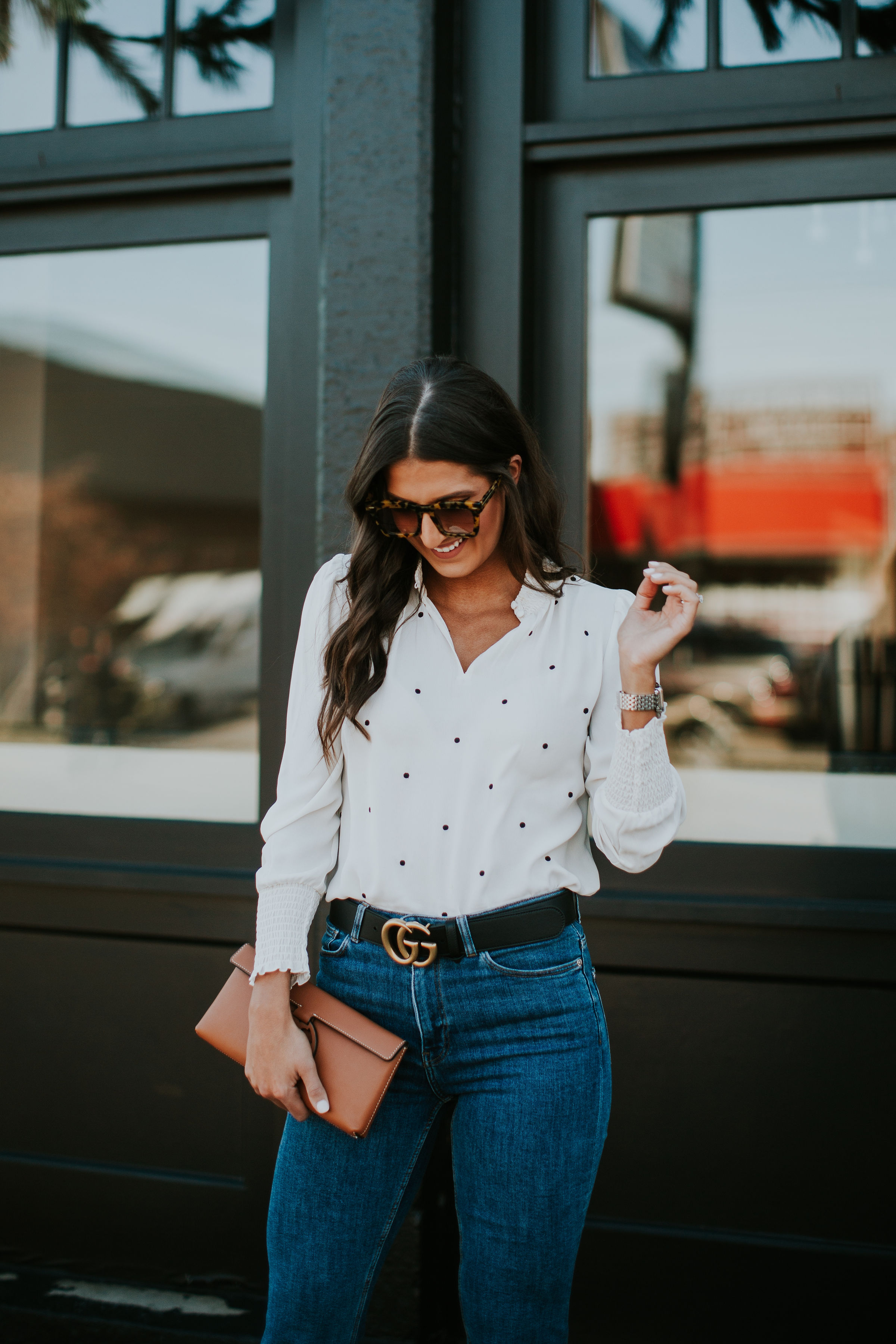 polka dot blouse, chiffon blouse, flare jeans, flared jeans, flare denim, classic style, black gucci belt, nude clutch, patent leather clutch, karen walker sunglasses, spring style, spring fashion // grace white a southern drawl